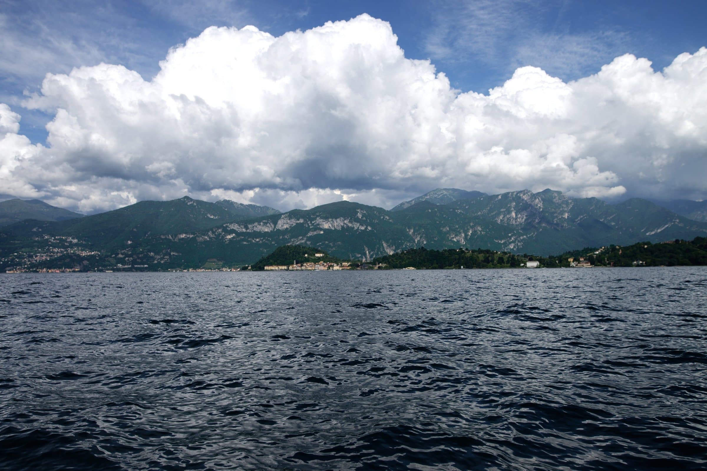 Summer clouds over the open water of Lake Como