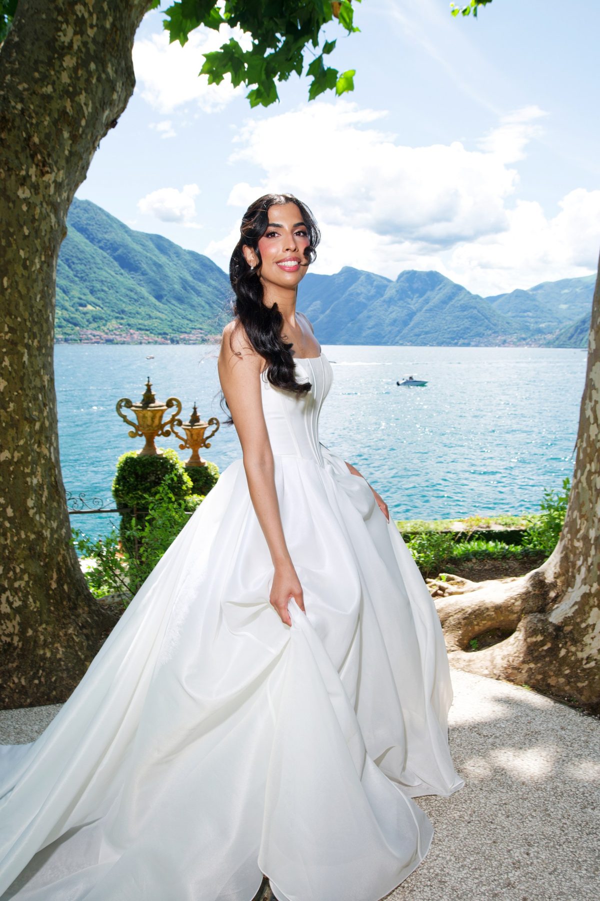 The bride turning on the terrace, Lake Como behind her